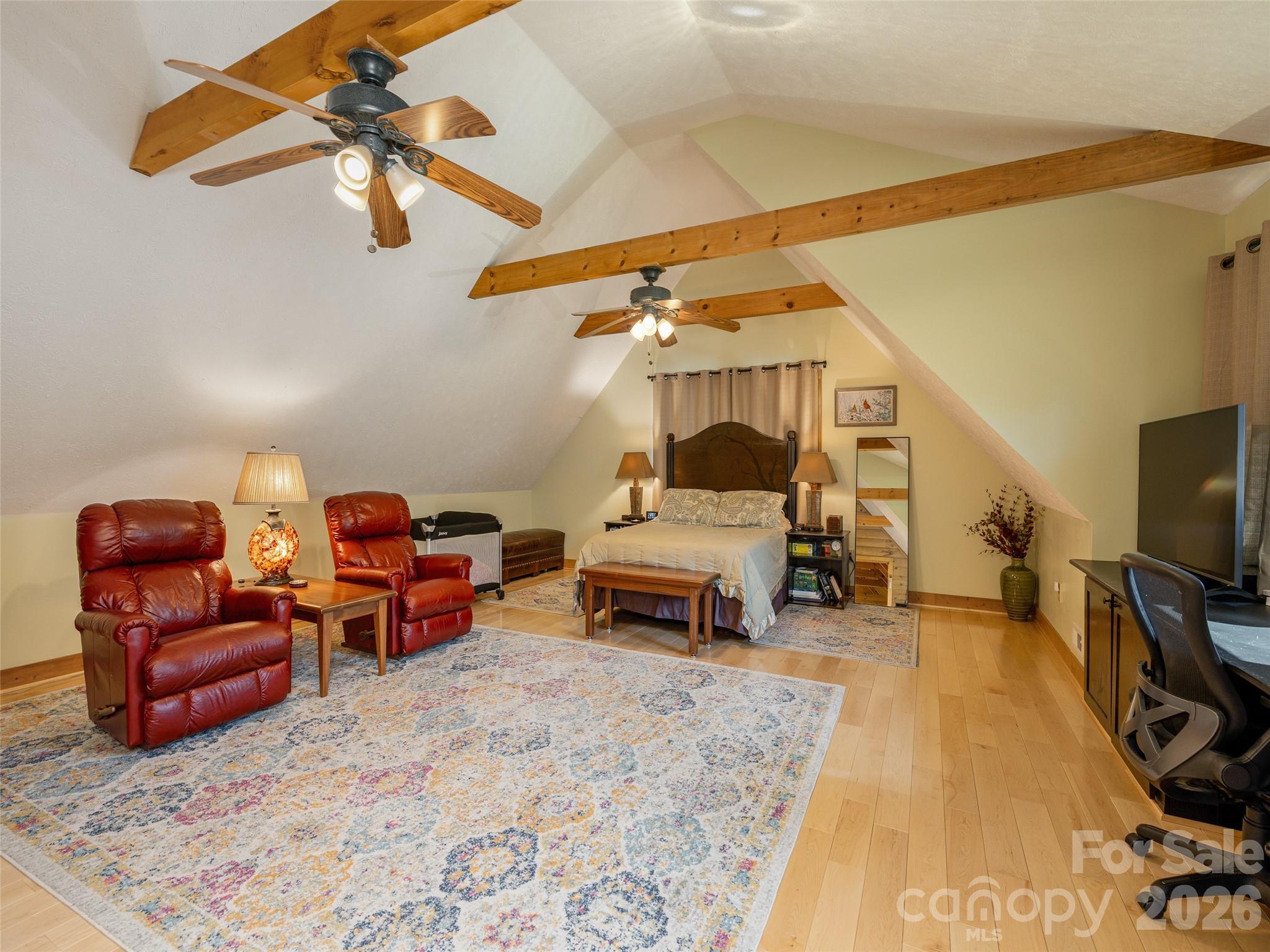 622 Oleta Road Hendersonville, NC 28792 - Photo 33 of 48 a living room with furniture and a flat screen tv
