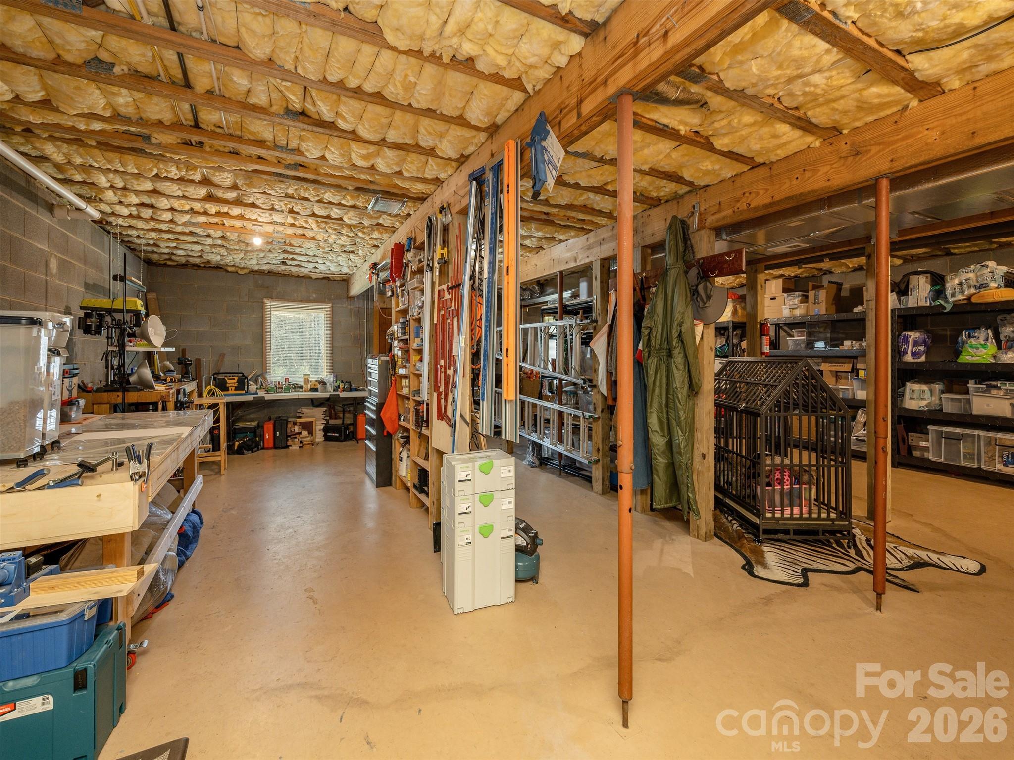 622 Oleta Road Hendersonville, NC 28792 - Photo 36 of 48 a view of a room with gym equipment