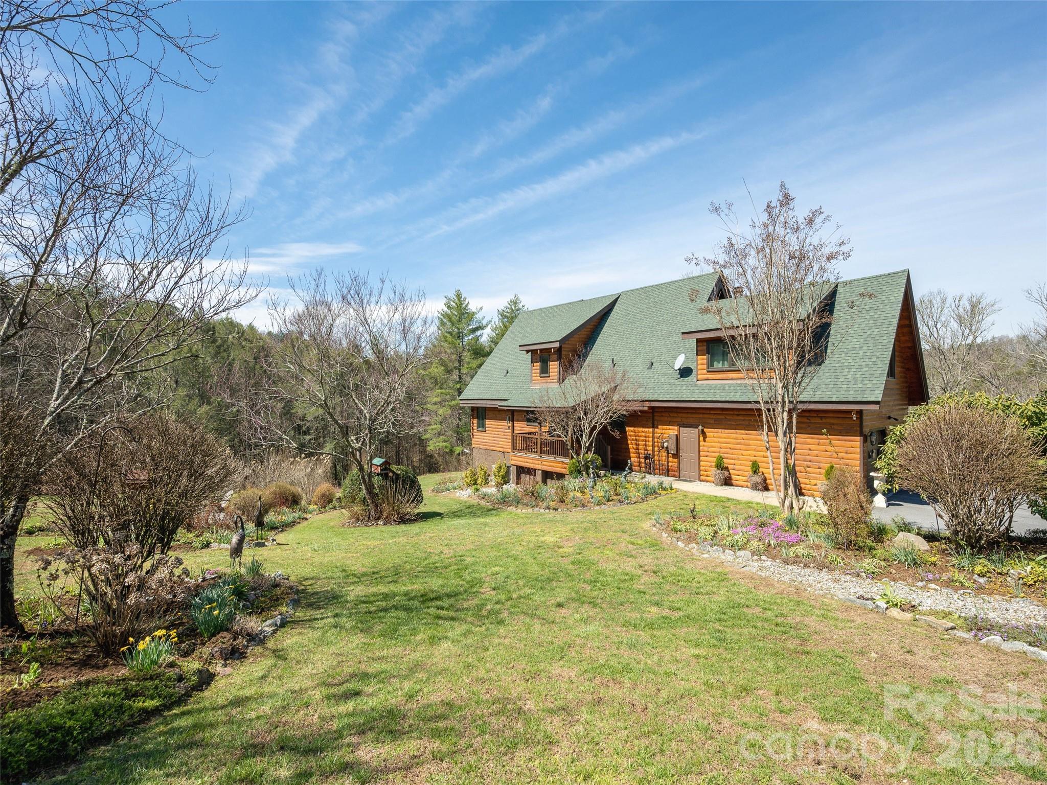 622 Oleta Road Hendersonville, NC 28792 - Photo 40 of 48 a view of a house with a big yard