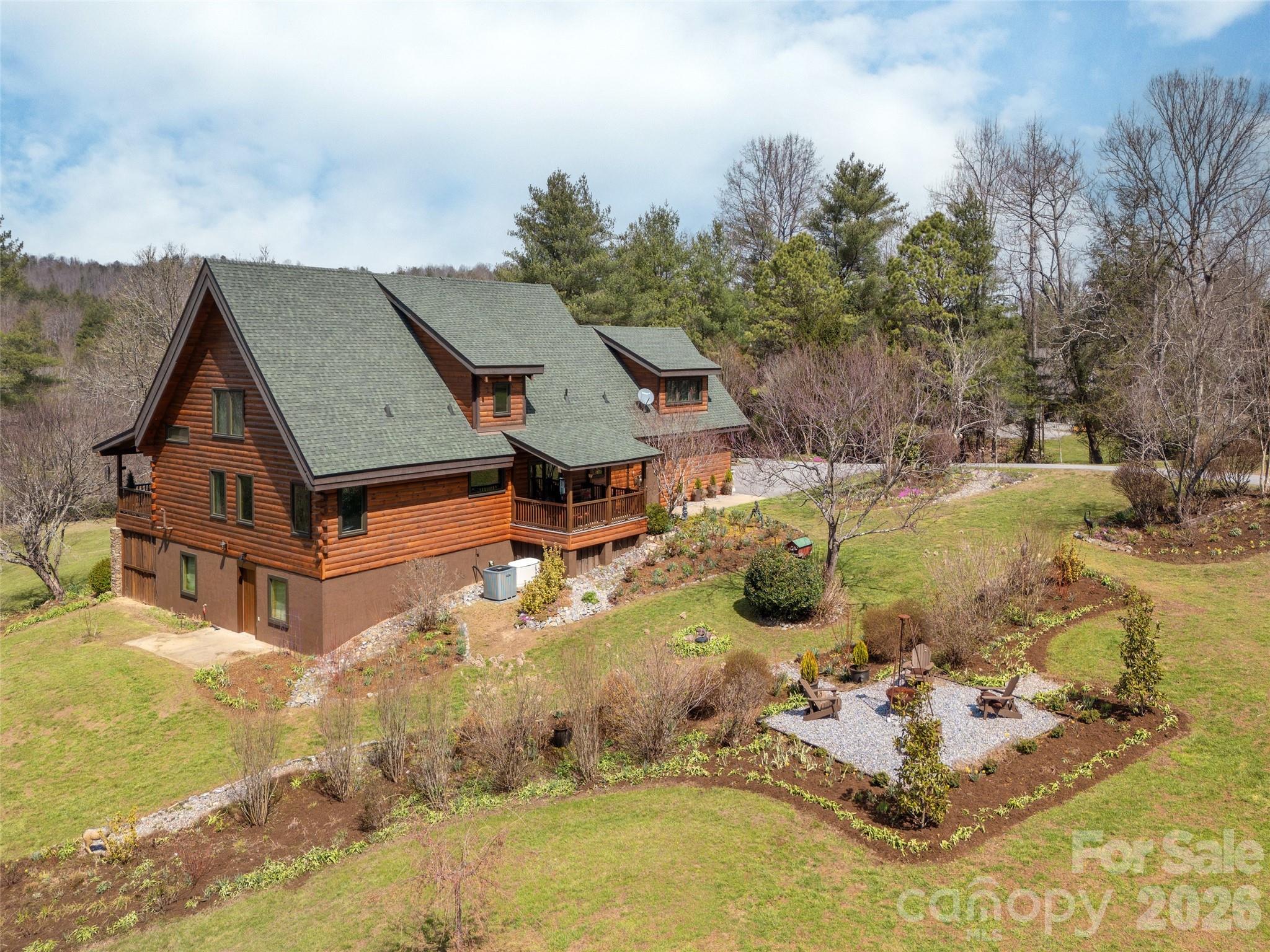 622 Oleta Road Hendersonville, NC 28792 - Photo 42 of 48 an aerial view of a house with yard swimming pool and mountain view