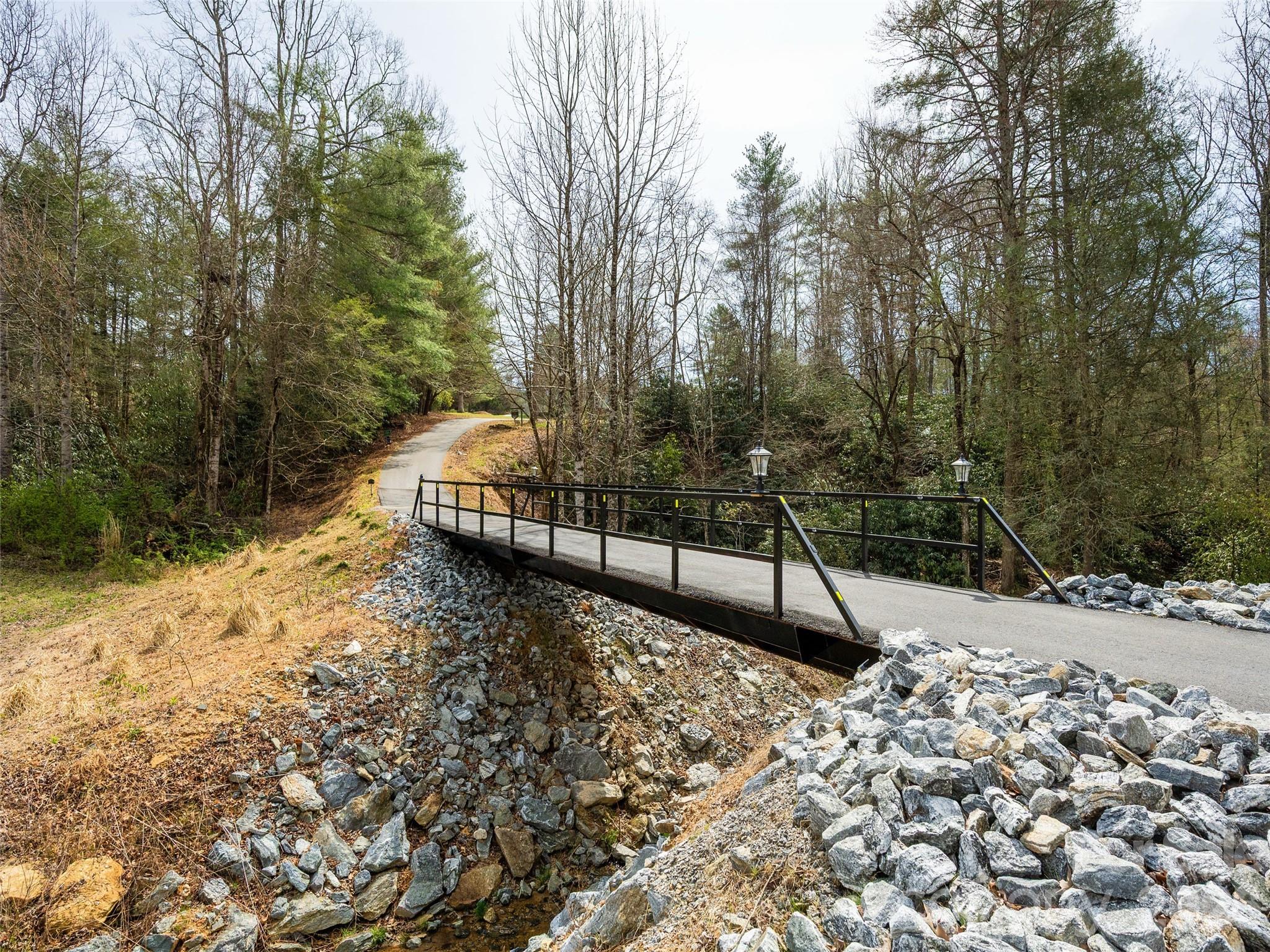 622 Oleta Road Hendersonville, NC 28792 - Photo 46 of 48 a view of a pathway with a yard