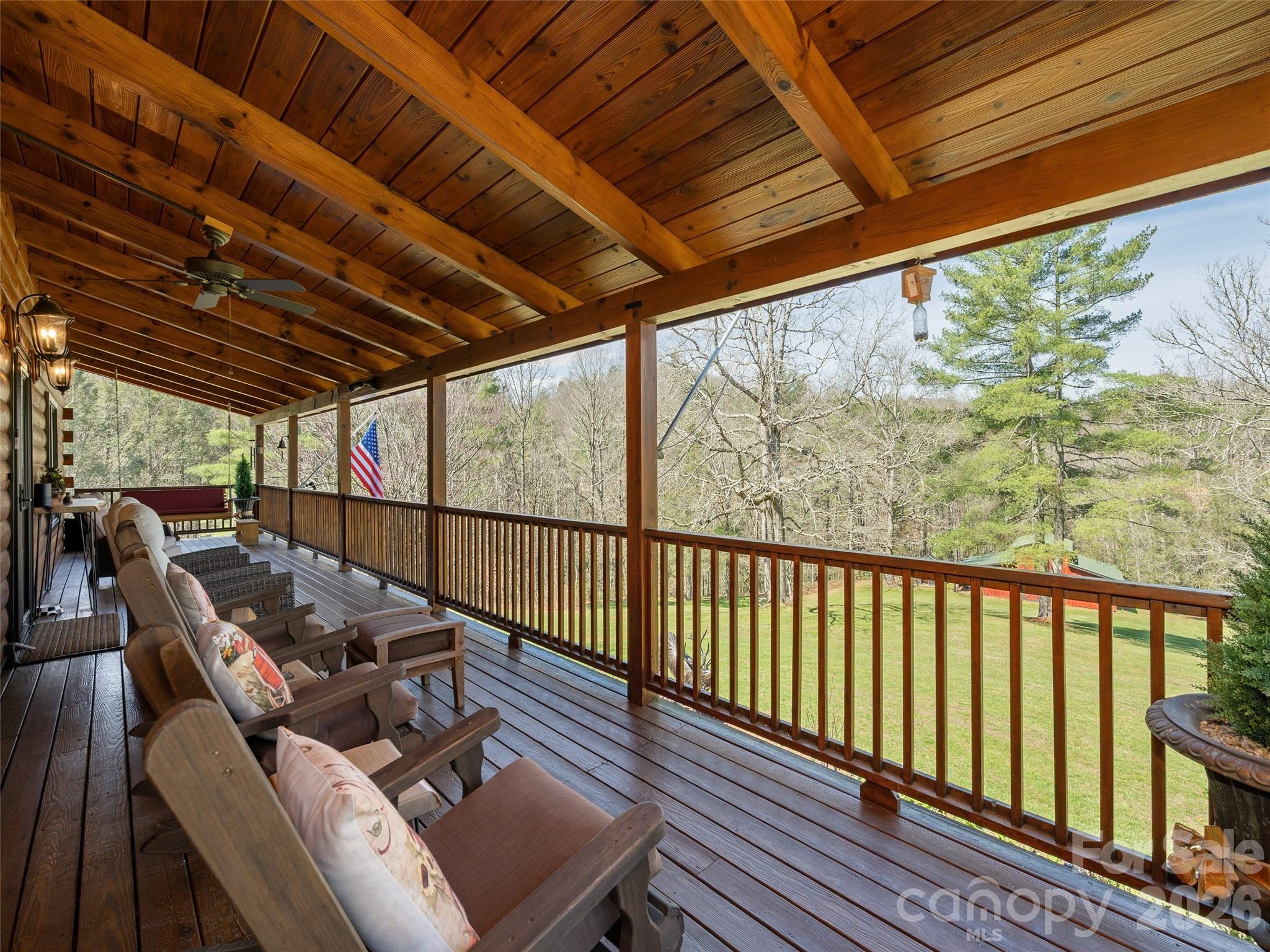622 Oleta Road Hendersonville, NC 28792 - Photo 5 of 48 a balcony with wooden floor