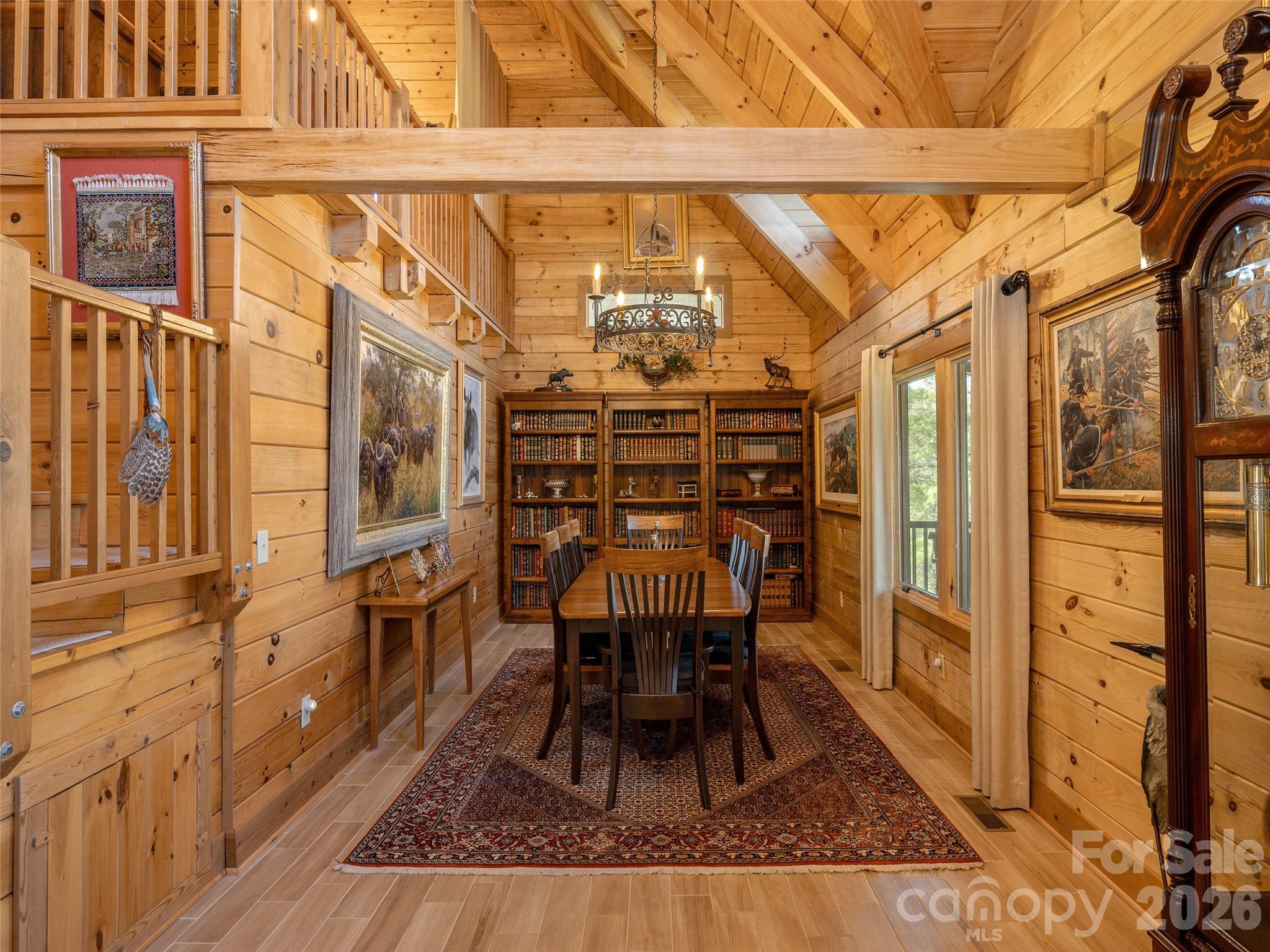 622 Oleta Road Hendersonville, NC 28792 - Photo 9 of 48 a dining room with furniture and a rug