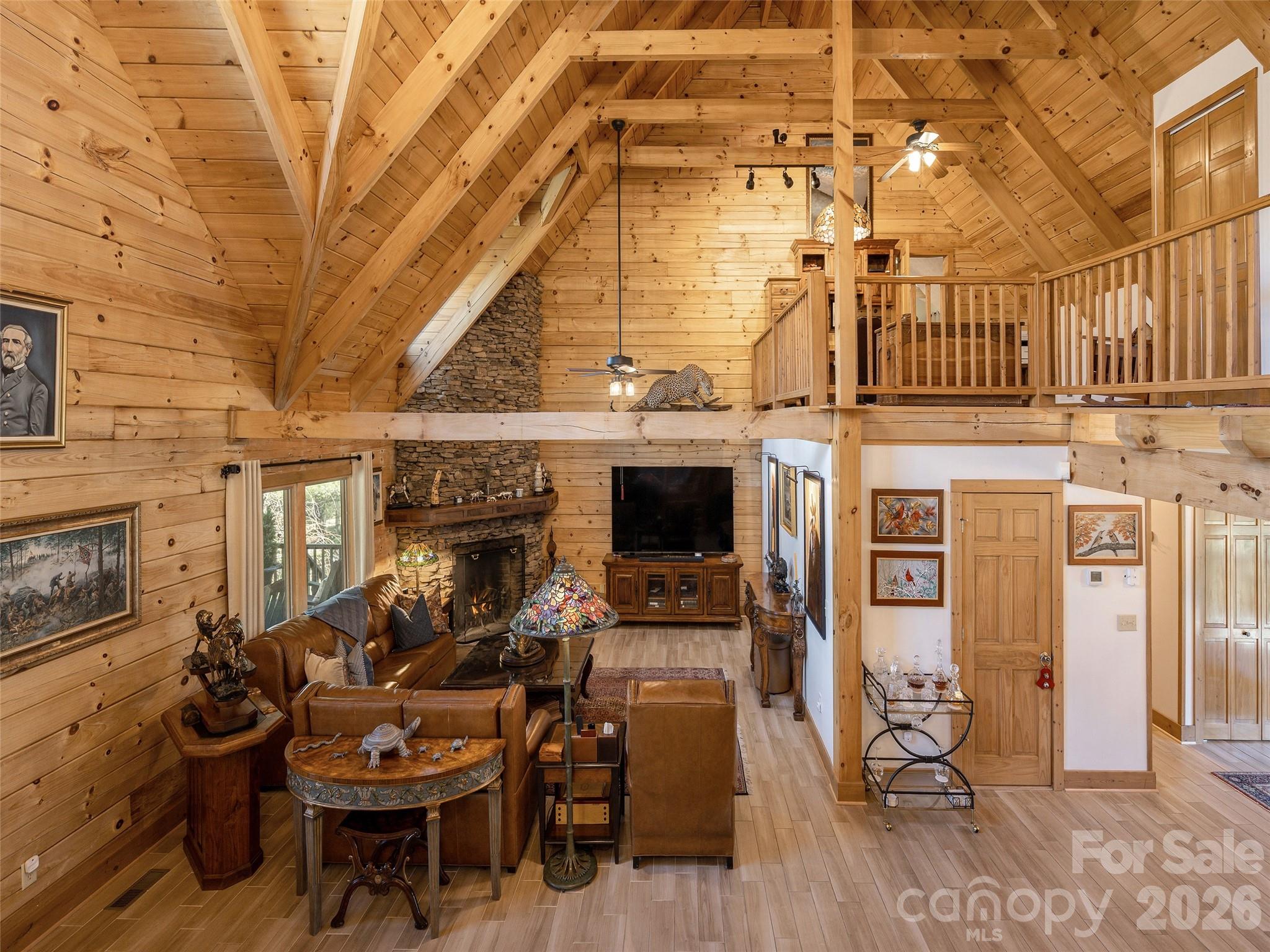 622 Oleta Road Hendersonville, NC 28792 - Photo 10 of 48 a view of a patio with table and chairs with wooden floor and fence