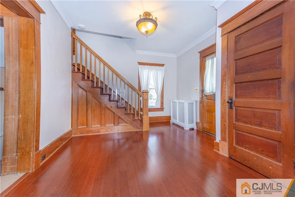624 Ridge Road Monmouth Junction, NJ 08852 - Photo 11 of 15 a view of an entryway with wooden floor