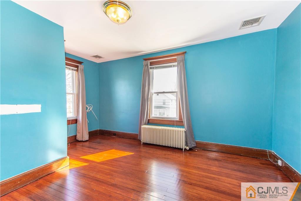 624 Ridge Road Monmouth Junction, NJ 08852 - Photo 9 of 15 a view of empty room with wooden floor