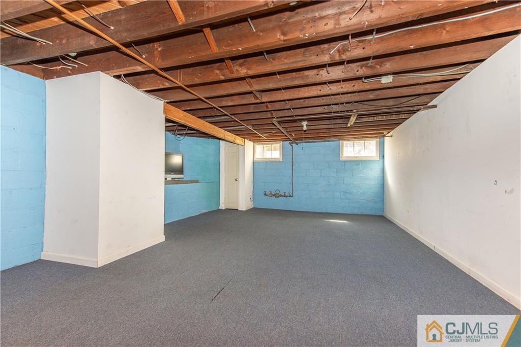 624 Ridge Road Monmouth Junction, NJ 08852 - Photo 10 of 15 a view of empty room with windows