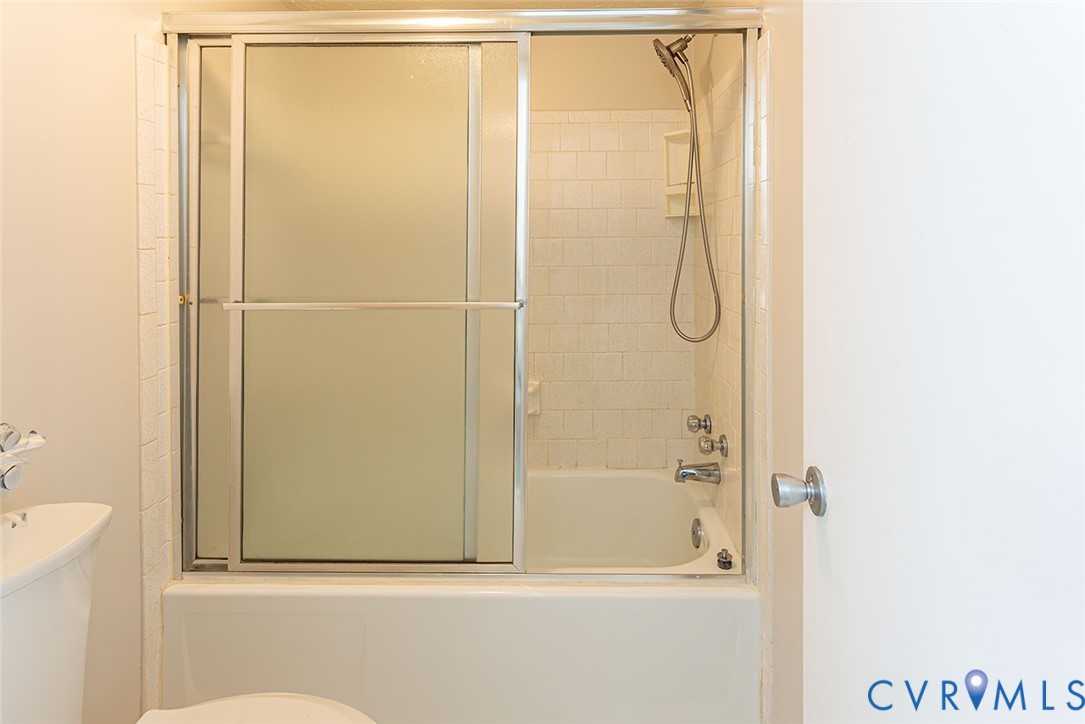 1500 Largo Road, Unit 201 Henrico, VA 23238 - Photo 18 of 23 Full bathroom with enclosed tub / shower combo and