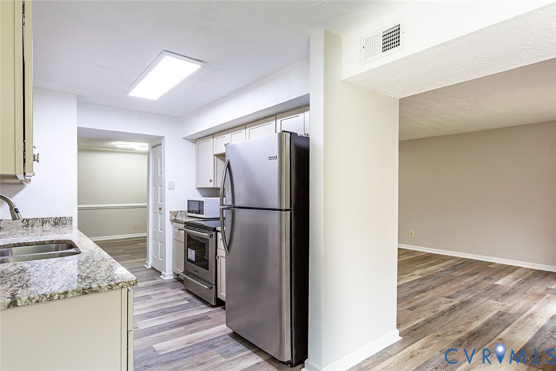 1500 Largo Road, Unit 201 Henrico, VA 23238 - Photo 7 of 23 Kitchen featuring appliances with stainless steel