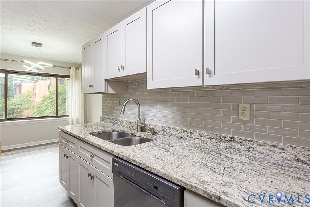 1500 Largo Road, Unit 201 Henrico, VA 23238 - Photo 9 of 23 Kitchen featuring black dishwasher, light stone co