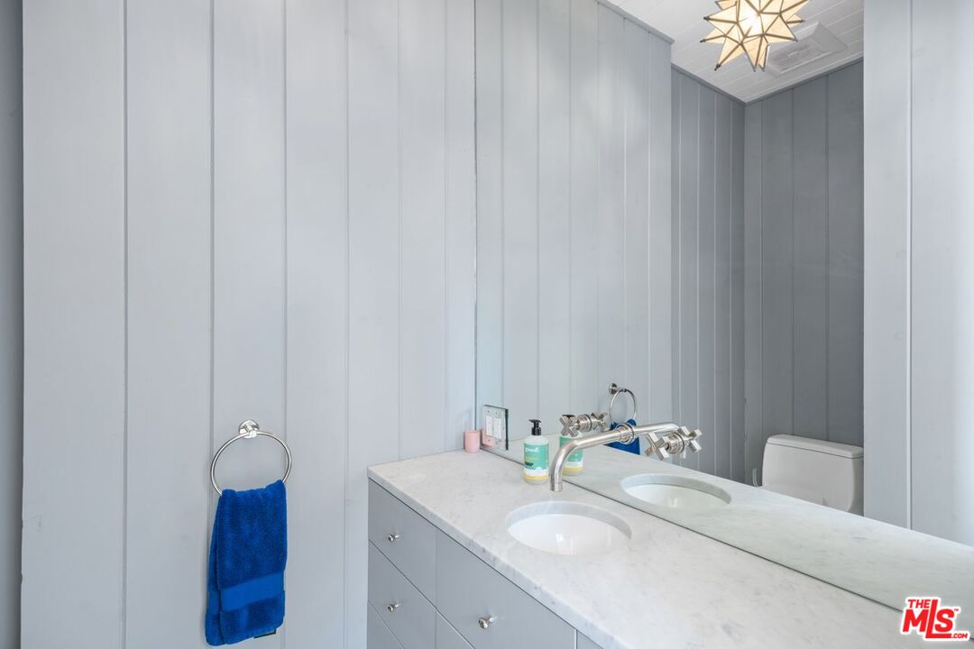 27212 Escondido Beach Road Malibu, CA 90265 - Photo 12 of 34 a bathroom with a sink and a mirror
