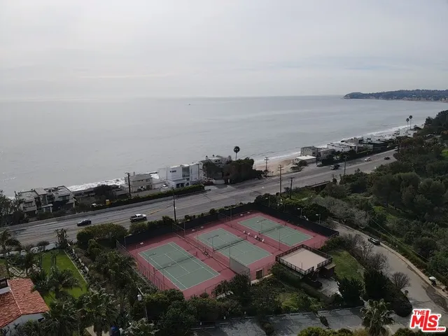 a view of a house with a road from a house