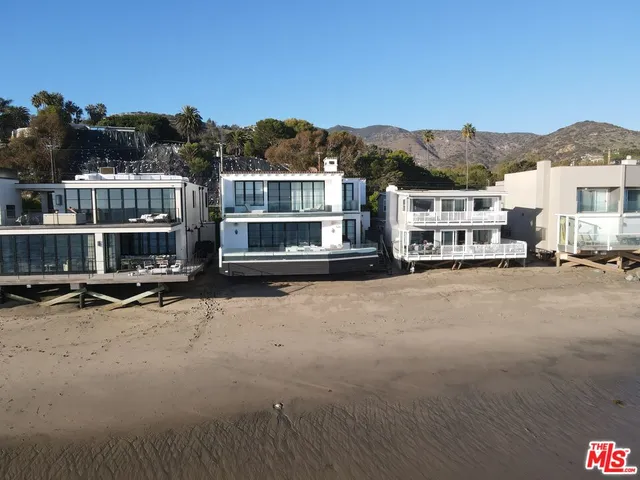 a view of residential houses with city view