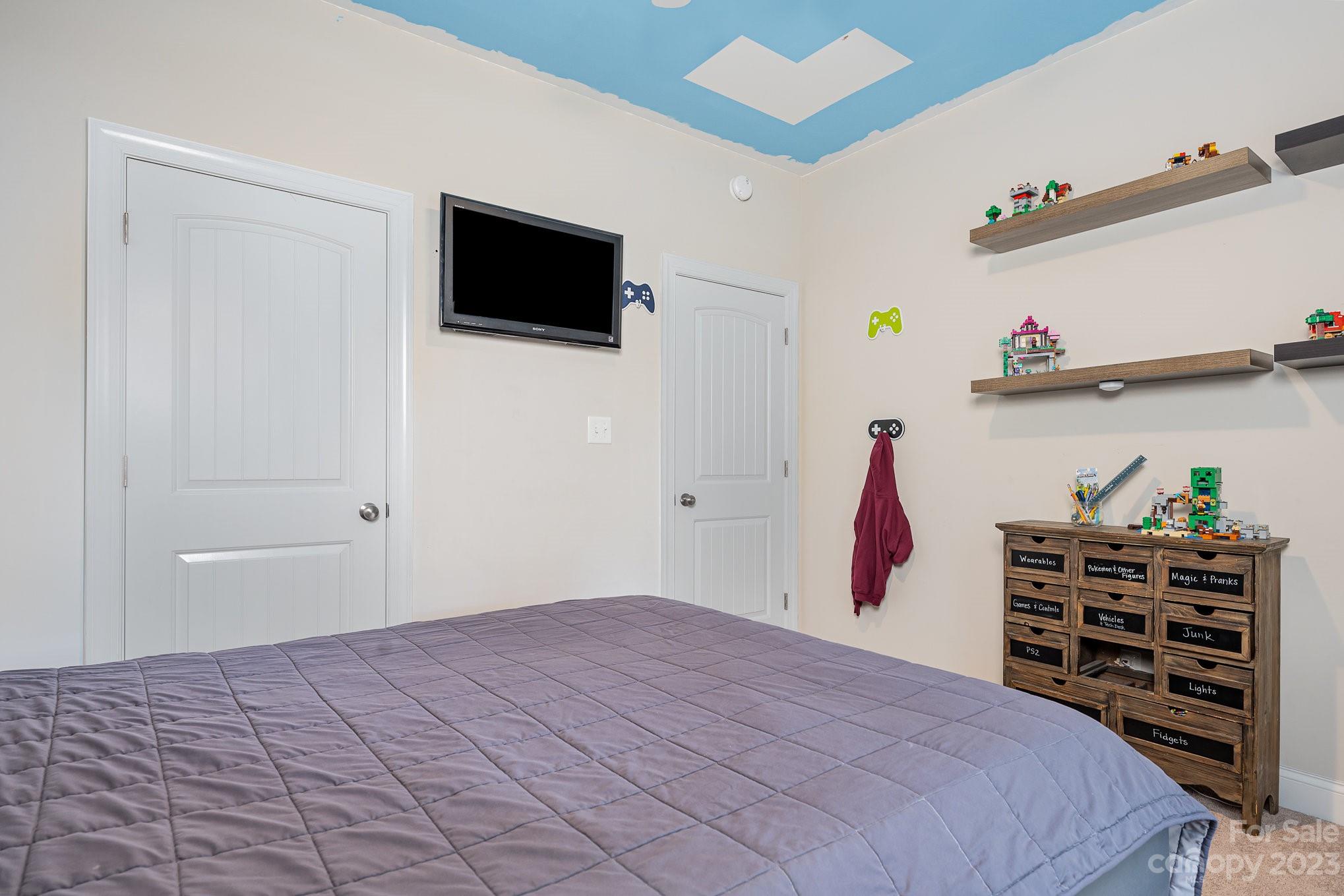 2906 Anderson Road South Catawba, SC 29704 - Photo 11 of 27 a bedroom with a bed and a flat tv screen