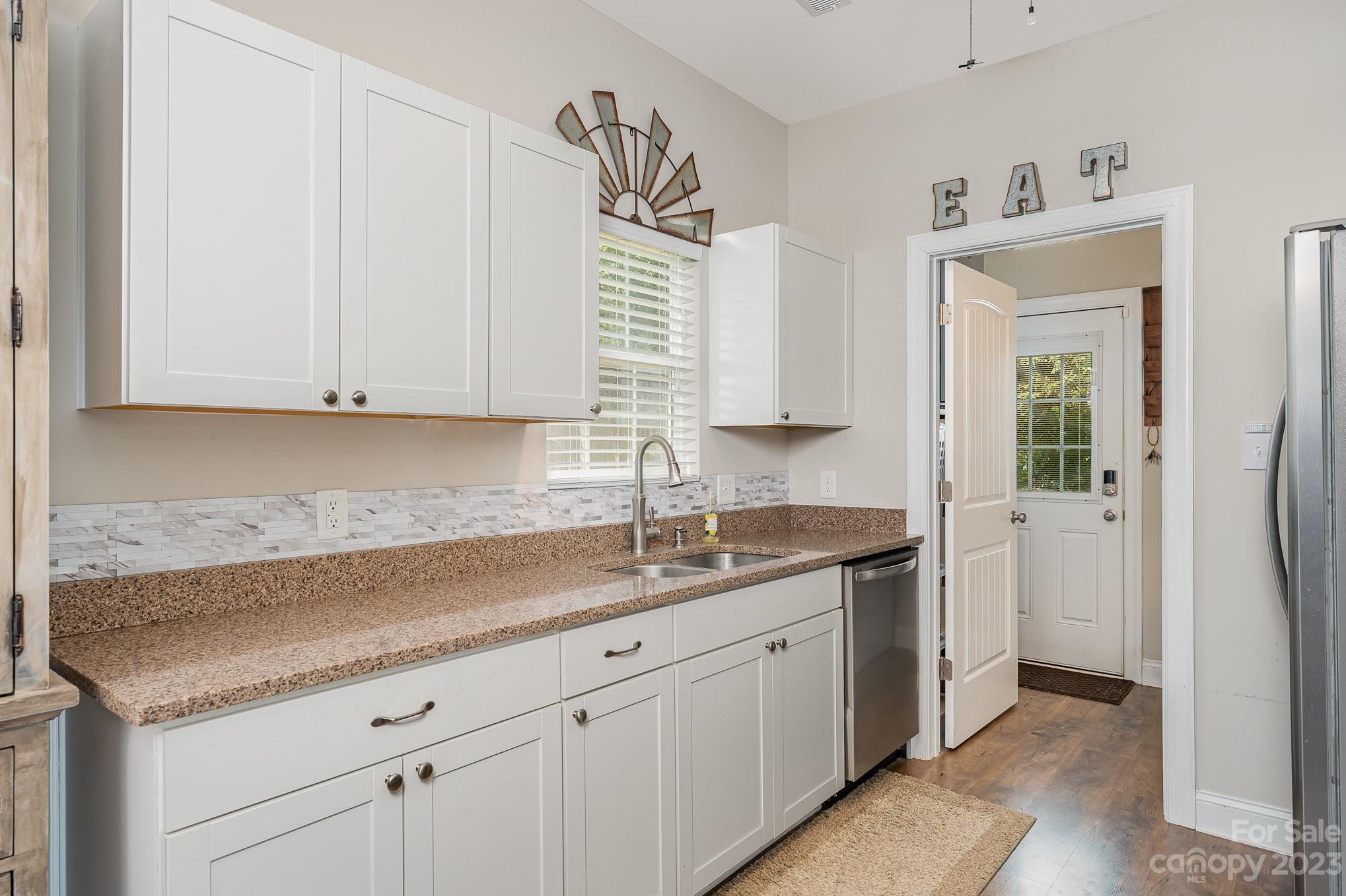 2906 Anderson Road South Catawba, SC 29704 - Photo 16 of 27 a kitchen with granite countertop a sink and cabinets