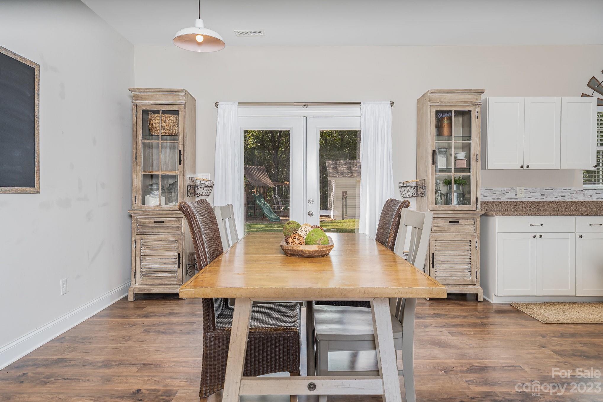 2906 Anderson Road South Catawba, SC 29704 - Photo 20 of 27 a view of a dining room with furniture and wooden floor