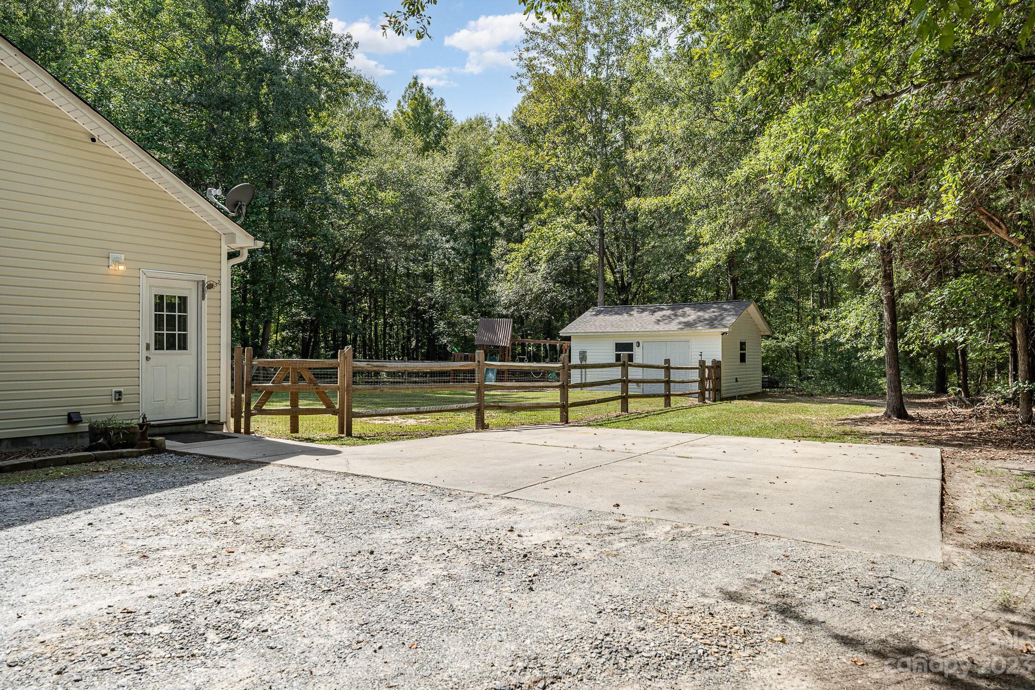 2906 Anderson Road South Catawba, SC 29704 - Photo 25 of 27 a view of a house with backyard and a tree