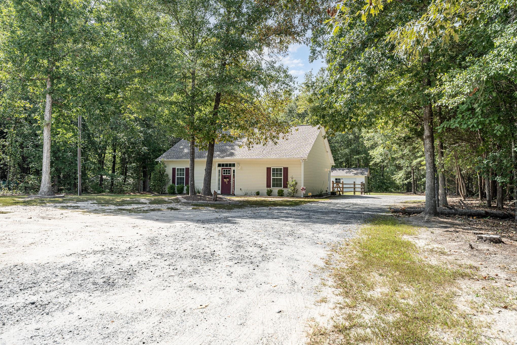 2906 Anderson Road South Catawba, SC 29704 - Photo 27 of 27 a view of a house with backyard and a tree