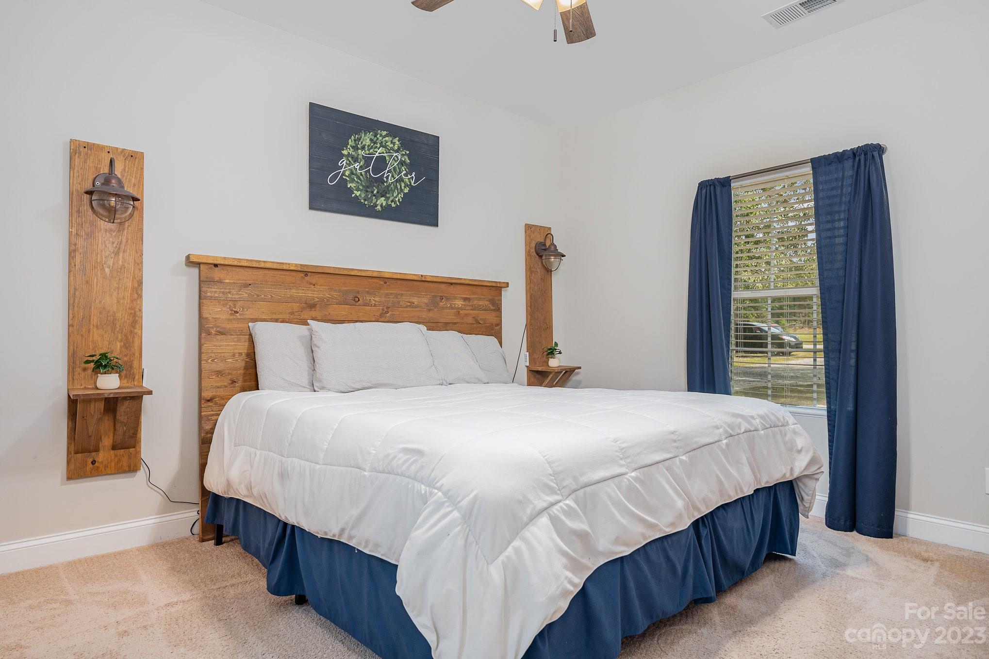 2906 Anderson Road South Catawba, SC 29704 - Photo 5 of 27 a bedroom with a bed and window
