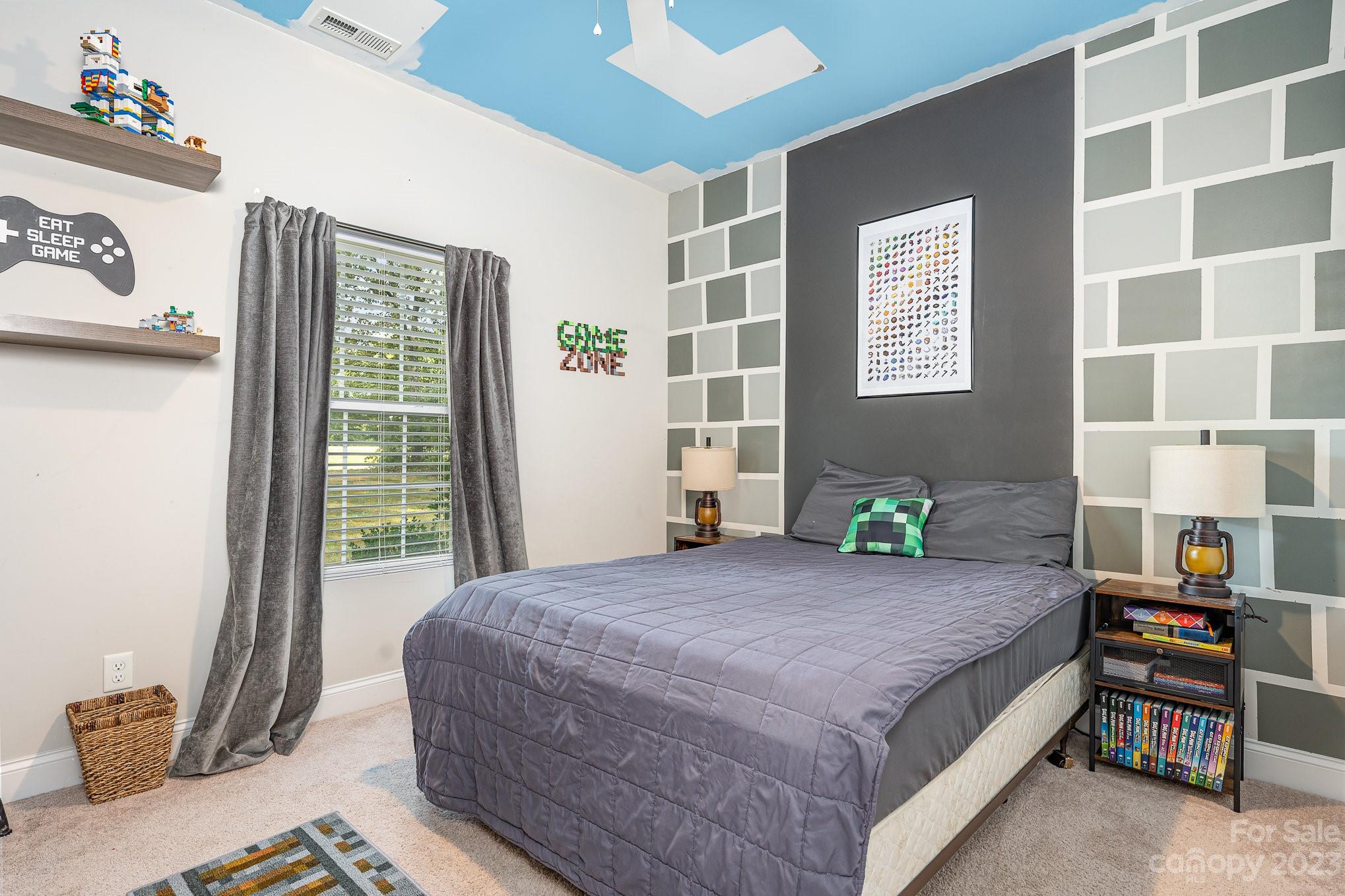 2906 Anderson Road South Catawba, SC 29704 - Photo 9 of 27 a bedroom with a bed and a window