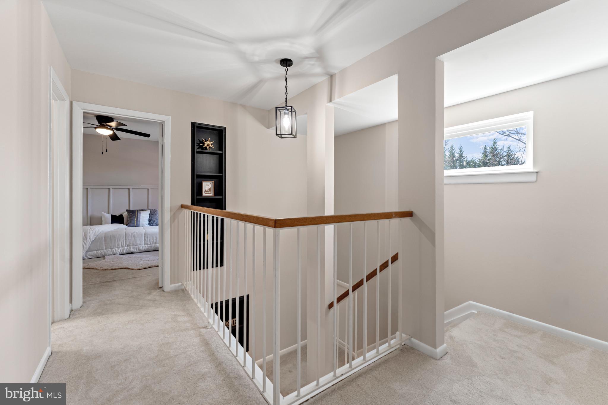 7512 Rolling Road Springfield, VA 22153 - Photo 18 of 32 a view of a hallway view with staircase