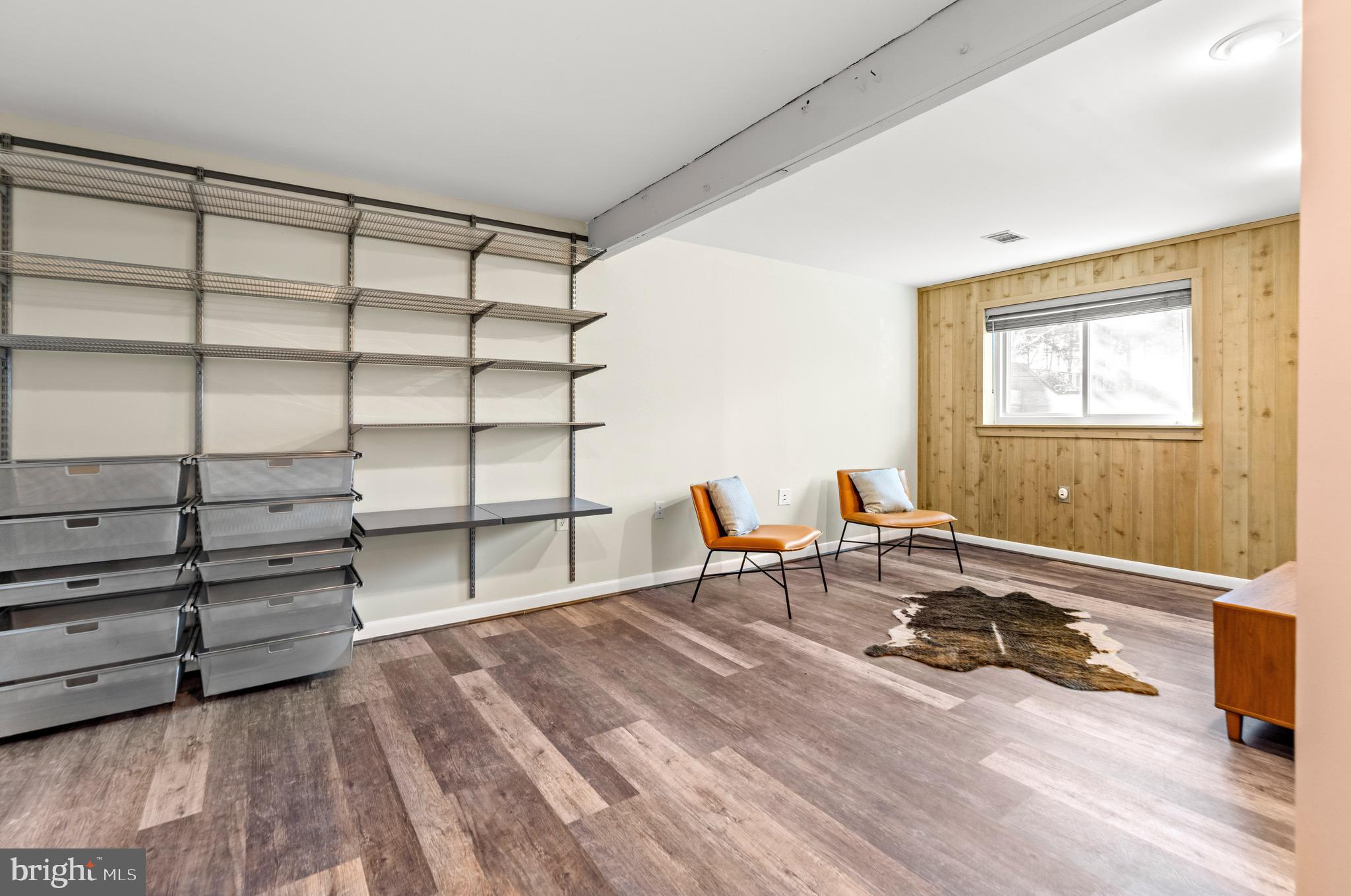 7512 Rolling Road Springfield, VA 22153 - Photo 24 of 32 a bedroom with furniture and a window