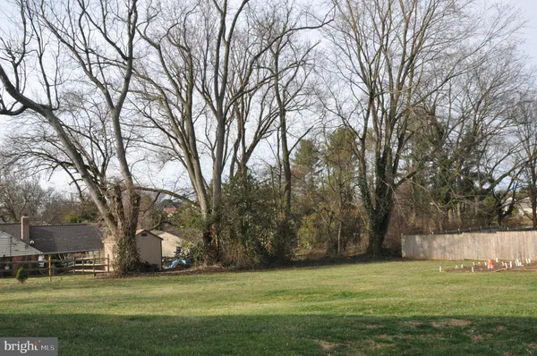 a view of a house with a back yard