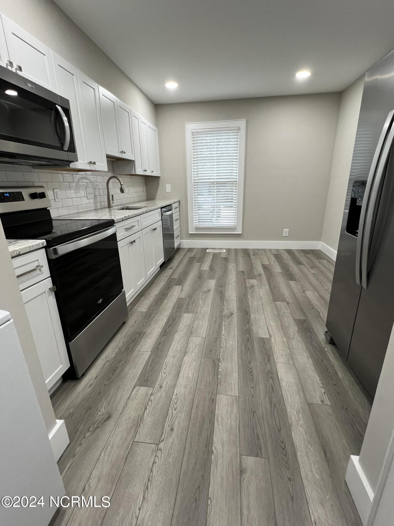 209 Bonnie Brook Road, Unit 1 Aberdeen, NC 28315 - Photo 2 of 14 All New Kitchen