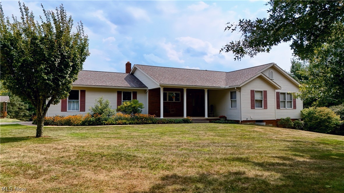 3464 Ridge Road Northwest Strasburg, OH 44680 - Photo 1 of 49 Ranch-style home featuring a front yard