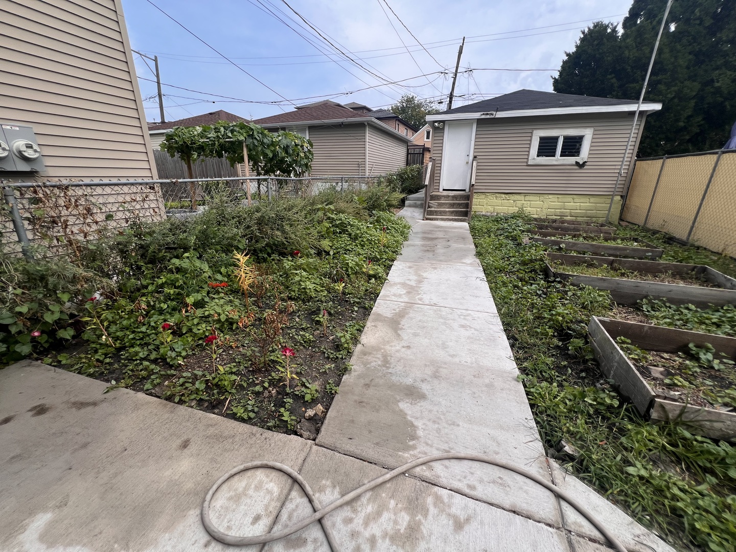 3741 South Union Avenue Chicago, IL 60609 - Photo 25 of 26 a front view of a house with garden