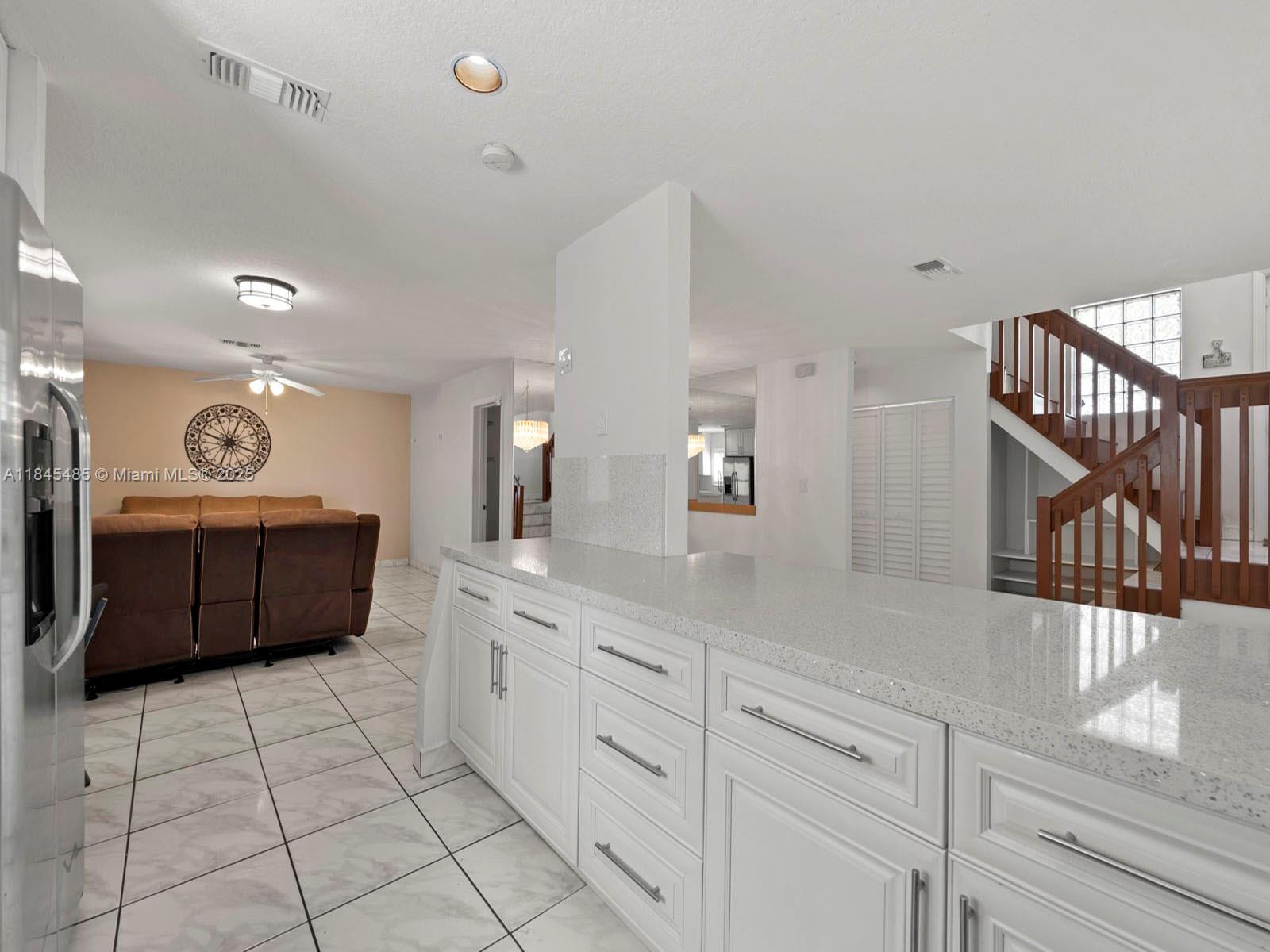 331 Northwest 101st Terrace Pembroke Pines, FL 33026 - Photo 18 of 42 a spacious bathroom with a shower a mirror and a sink