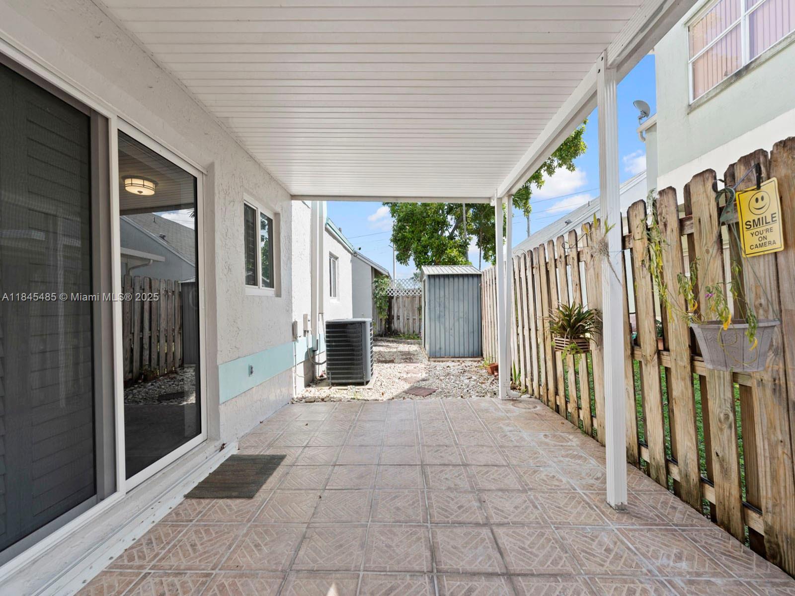 331 Northwest 101st Terrace Pembroke Pines, FL 33026 - Photo 25 of 42 a view of a entrance door of the house