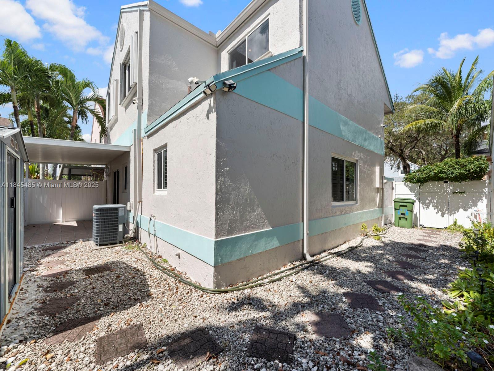 331 Northwest 101st Terrace Pembroke Pines, FL 33026 - Photo 26 of 42 a view of a house with a yard