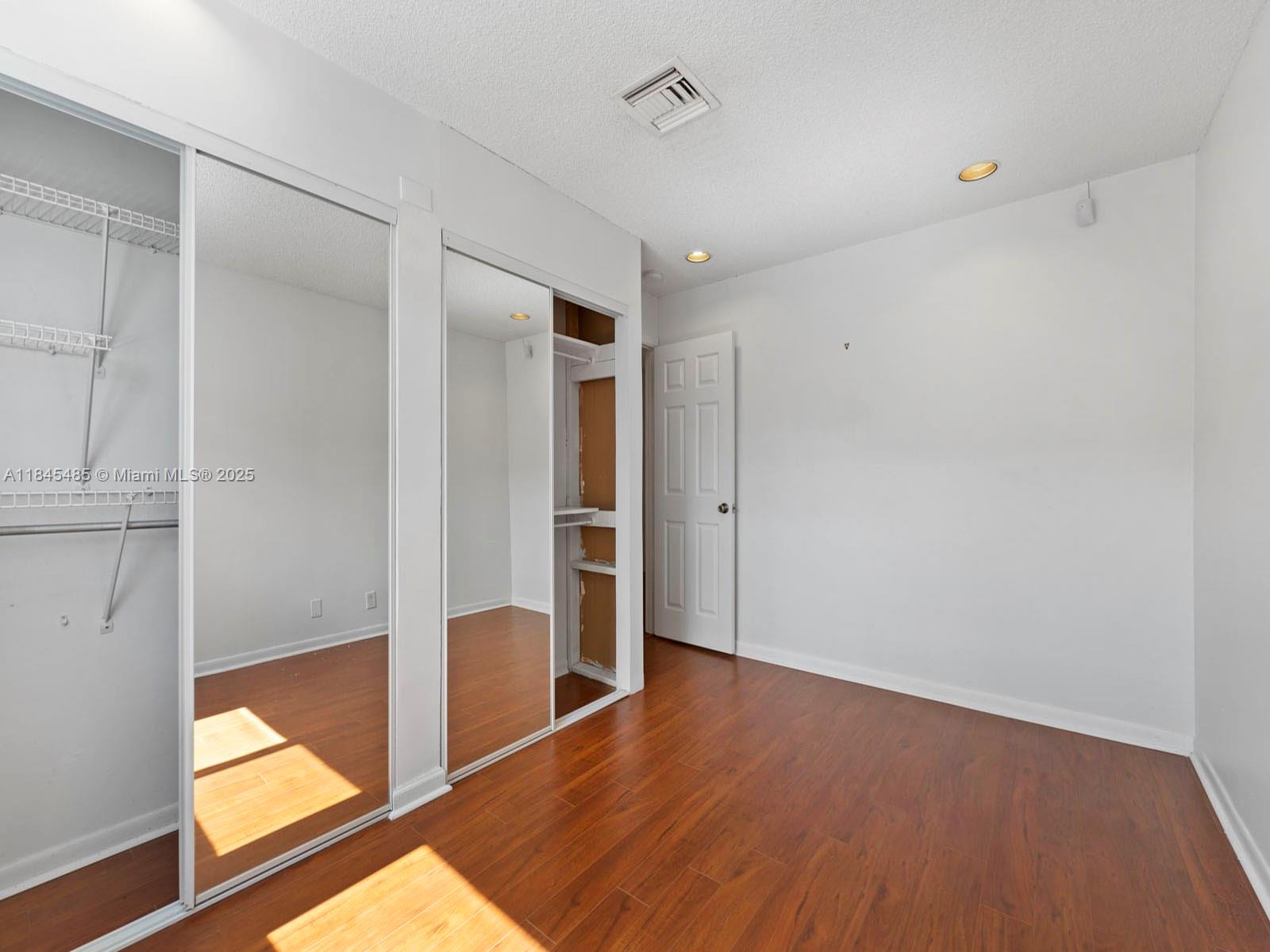 331 Northwest 101st Terrace Pembroke Pines, FL 33026 - Photo 36 of 42 a view of entryway with wooden floor