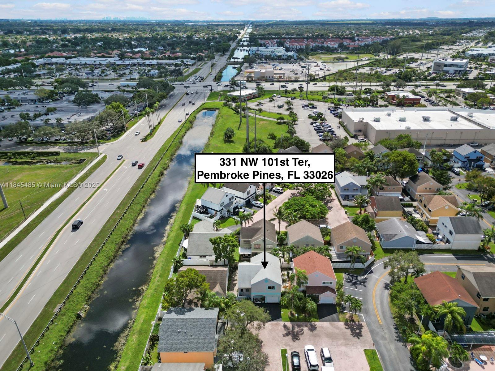 331 Northwest 101st Terrace Pembroke Pines, FL 33026 - Photo 4 of 42 an aerial view of a city