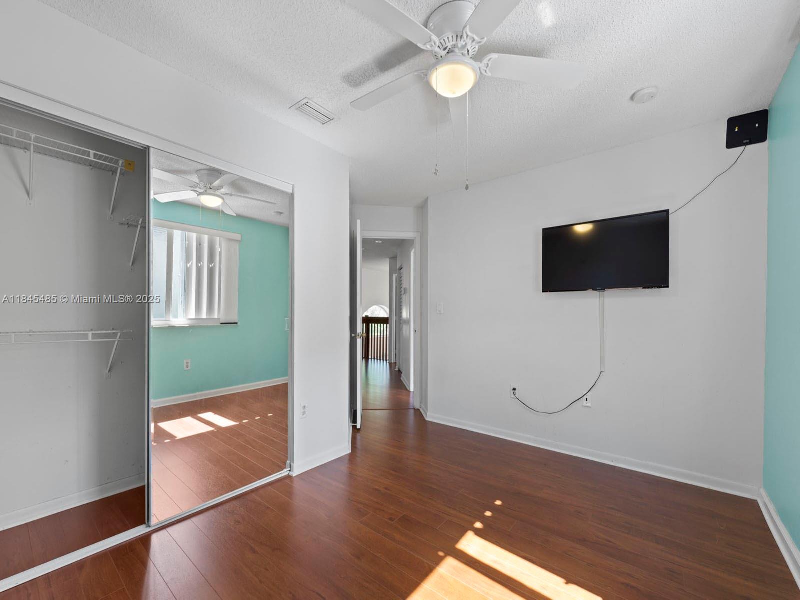 331 Northwest 101st Terrace Pembroke Pines, FL 33026 - Photo 42 of 42 a view of a livingroom with wooden floor