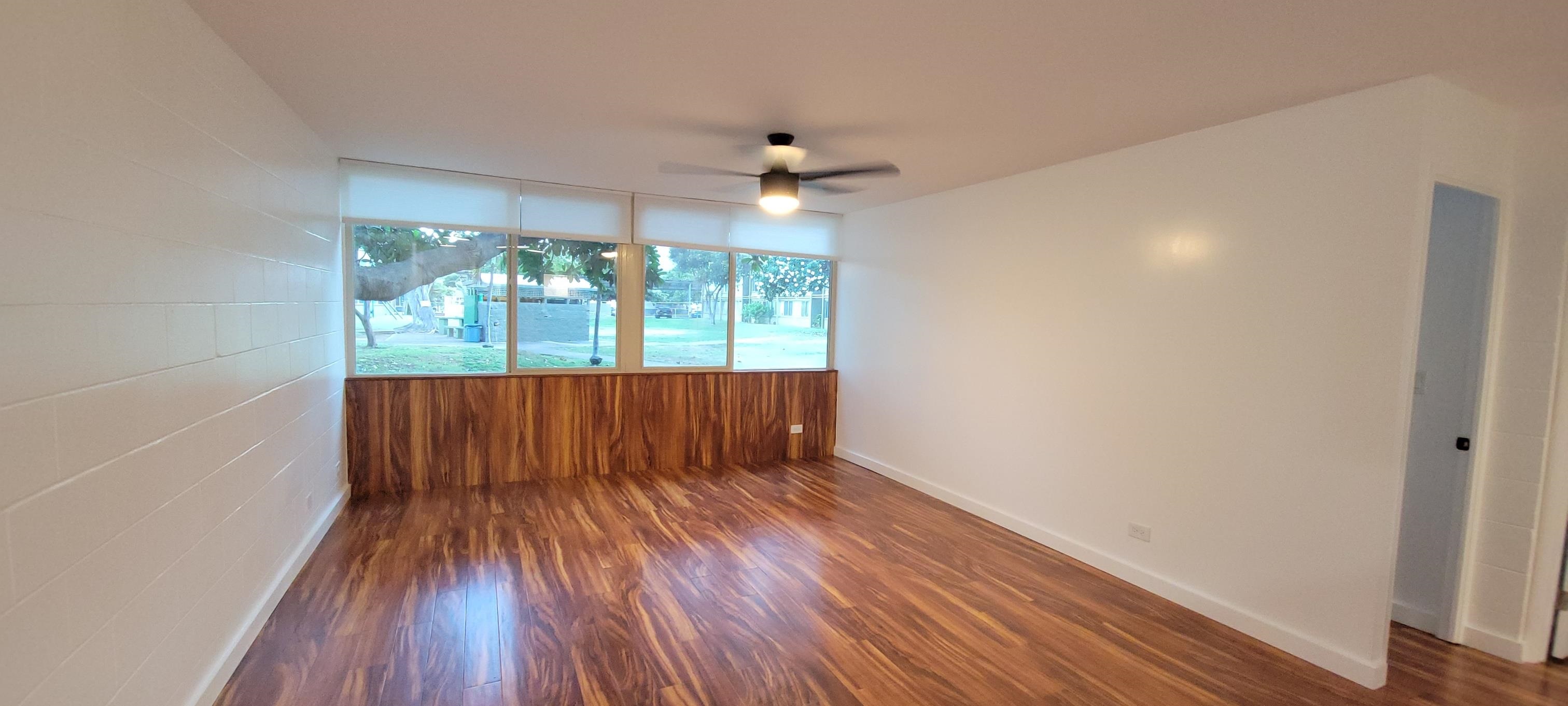 111 Kahului Beach Road, Unit A127 Kahului, HI 96732 - Photo 12 of 31 wooden floor in an empty room with a window
