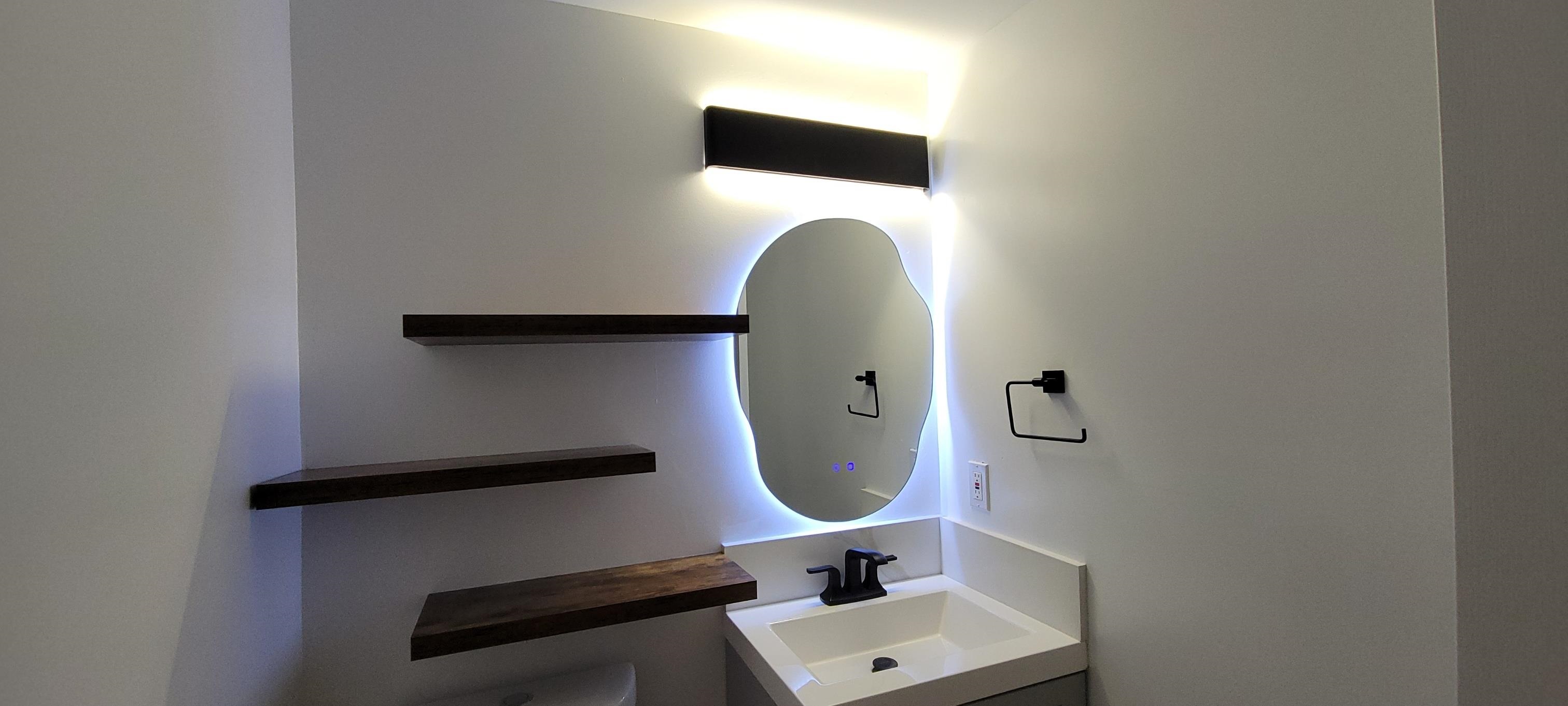 111 Kahului Beach Road, Unit A127 Kahului, HI 96732 - Photo 17 of 31 a bathroom with a sink and mirror