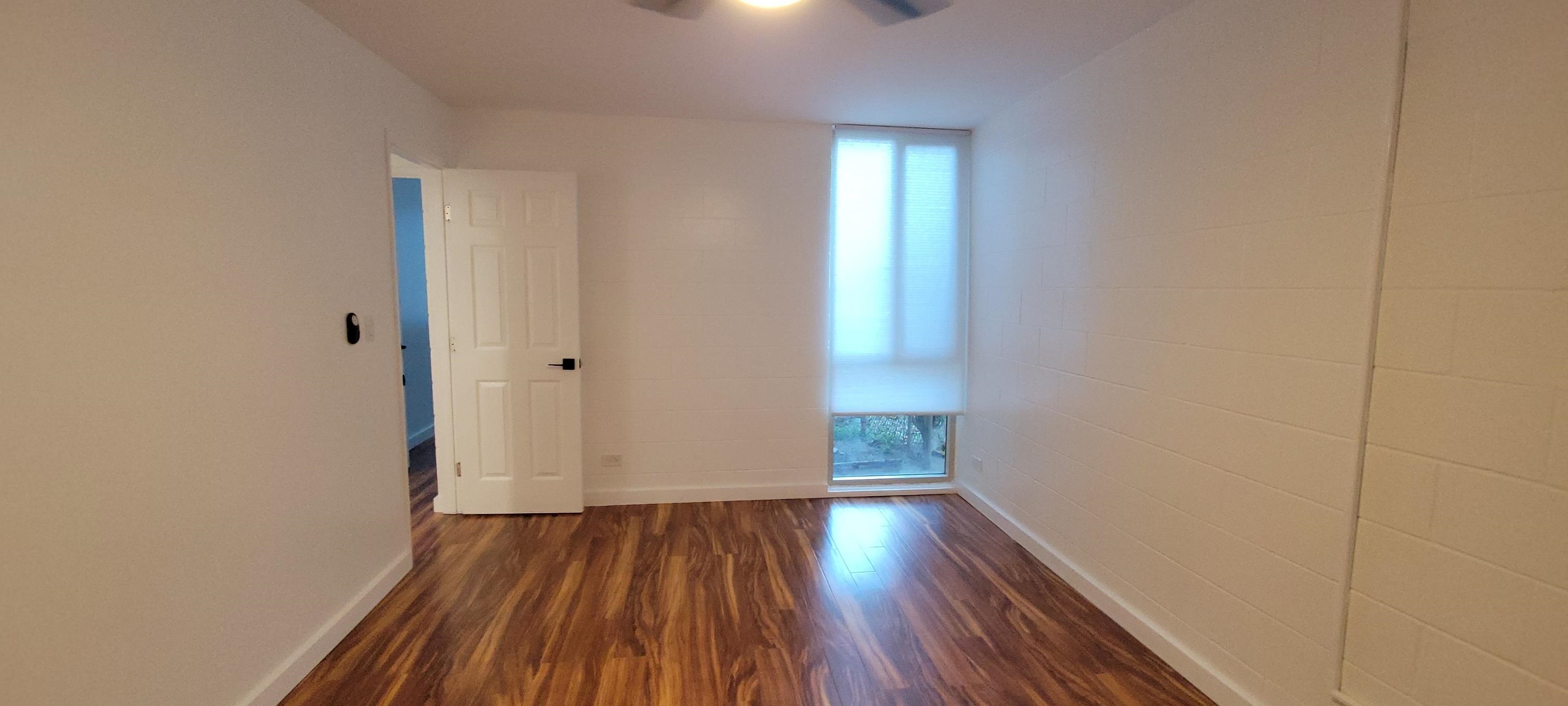 111 Kahului Beach Road, Unit A127 Kahului, HI 96732 - Photo 19 of 31 a view of a room with wooden floor and window