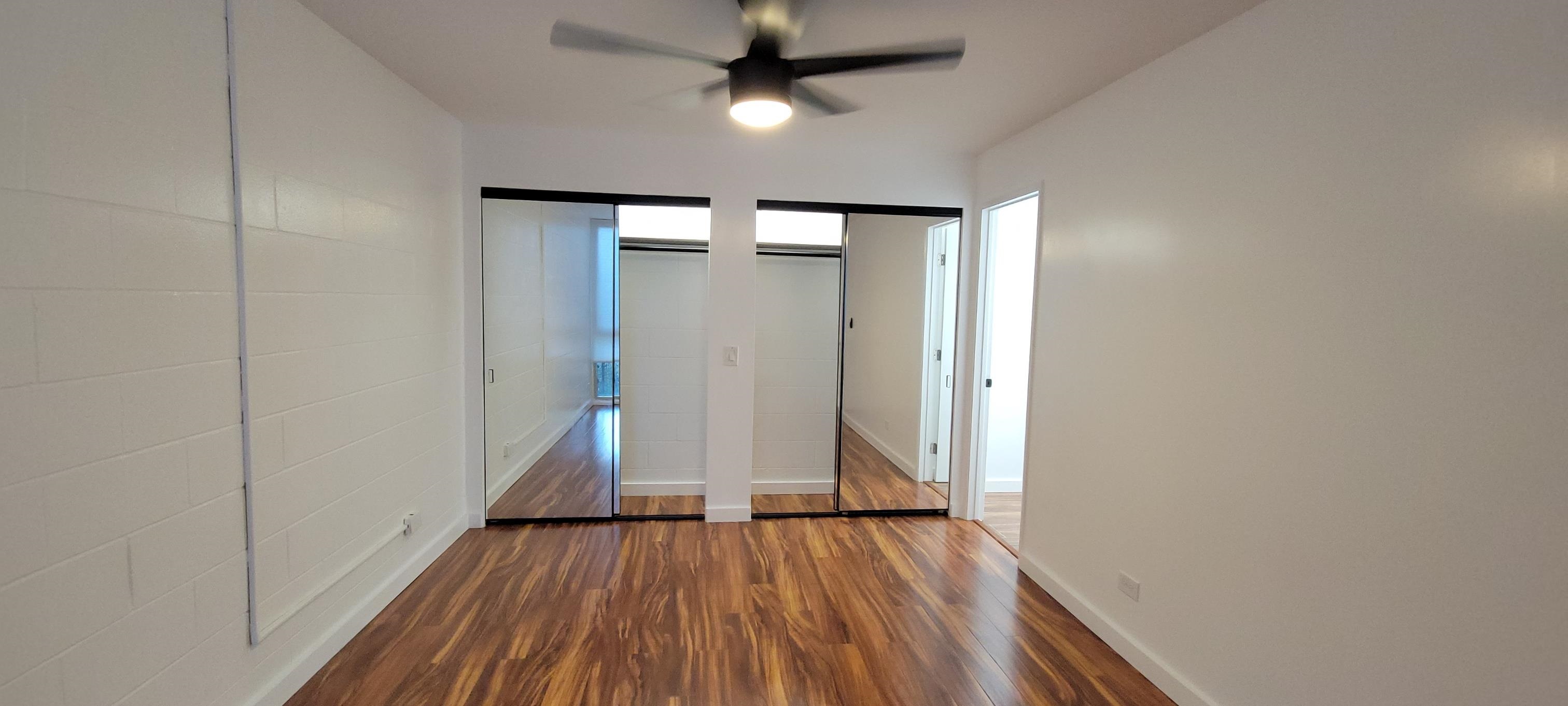 111 Kahului Beach Road, Unit A127 Kahului, HI 96732 - Photo 20 of 31 wooden floor in an empty room with a window