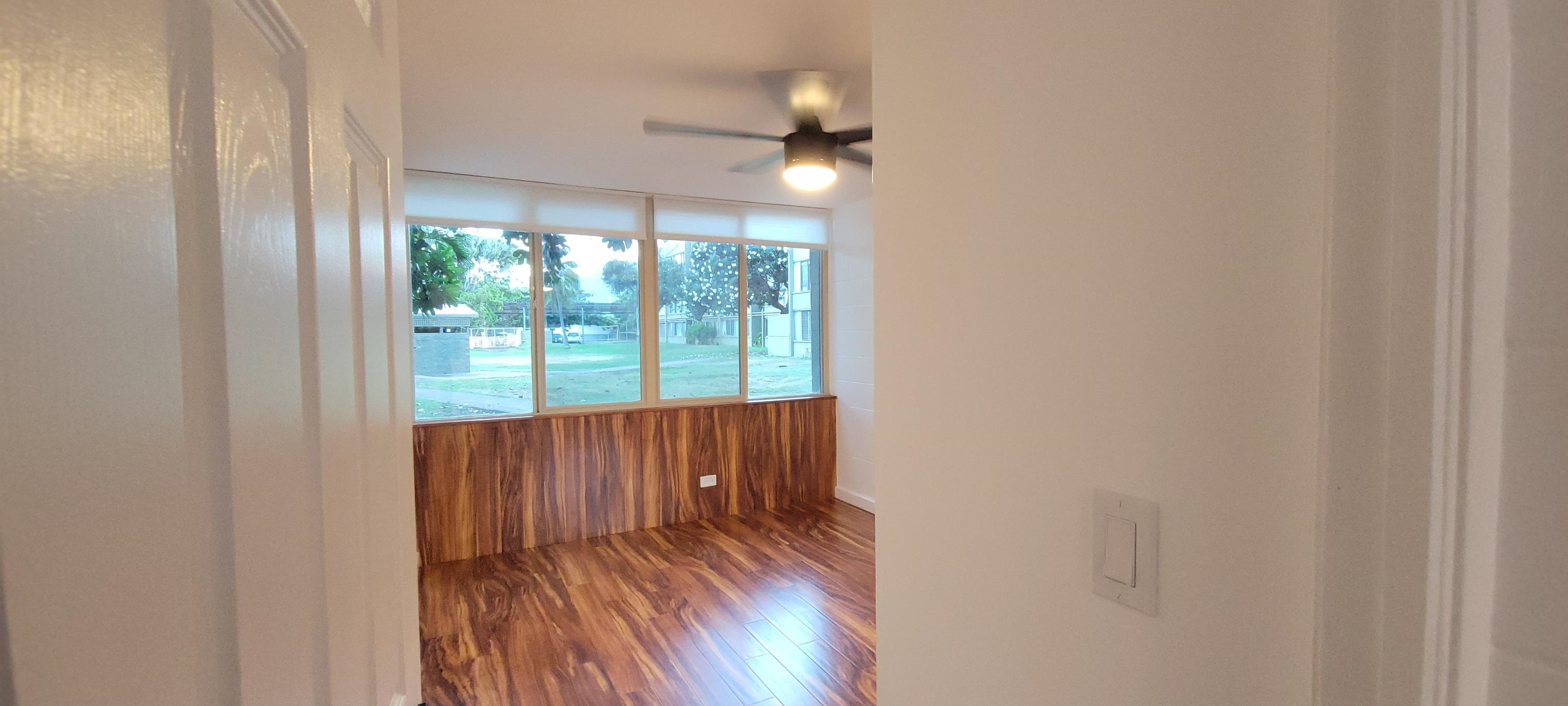 111 Kahului Beach Road, Unit A127 Kahului, HI 96732 - Photo 27 of 31 a view of hallway with wooden floor and fan