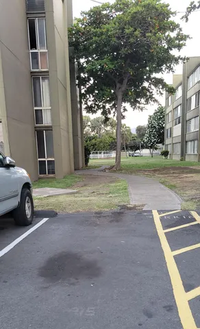 a view of a car in front of a house