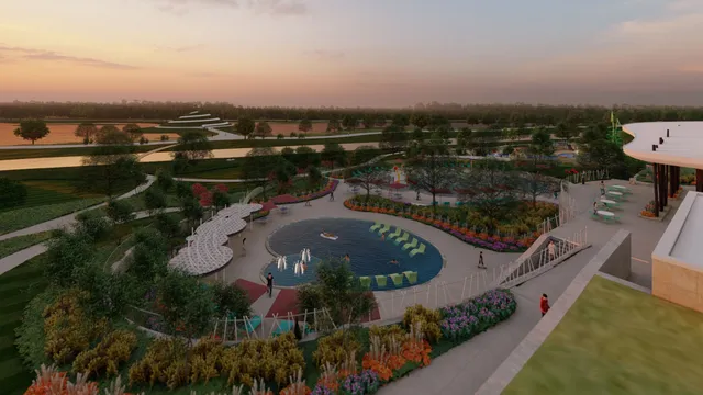 a view of a building with a big yard and a large trees