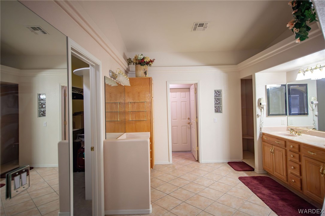2660 Pegasus Ranch Road Bullhead City, AZ 86429 - Photo 23 of 57 a view of bathroom with a shower and a sink