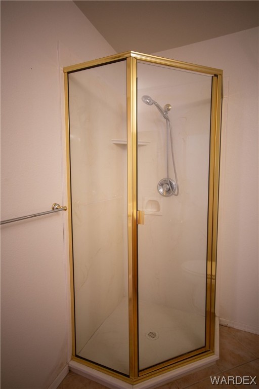 2660 Pegasus Ranch Road Bullhead City, AZ 86429 - Photo 34 of 57 a bathroom with a glass shower door