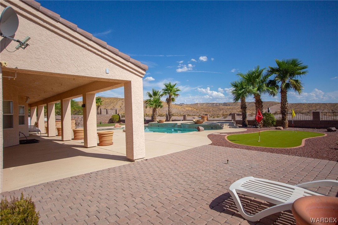 2660 Pegasus Ranch Road Bullhead City, AZ 86429 - Photo 43 of 57 a view of a backyard with swimming pool