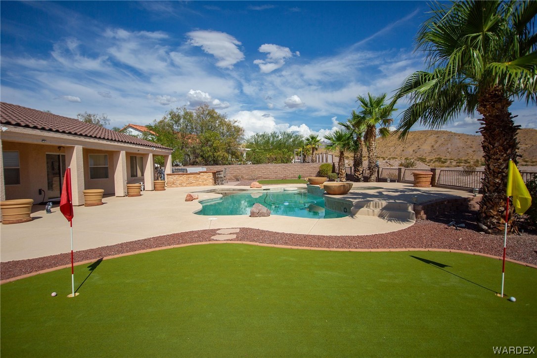 2660 Pegasus Ranch Road Bullhead City, AZ 86429 - Photo 44 of 57 a view of a house with a swimming pool