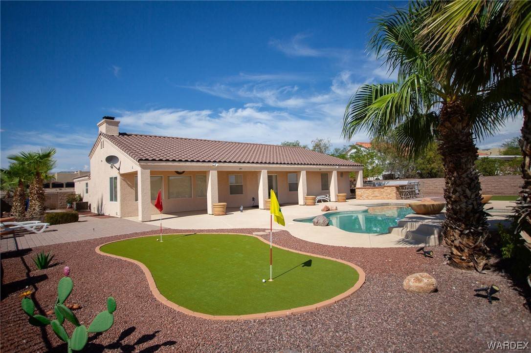 2660 Pegasus Ranch Road Bullhead City, AZ 86429 - Photo 45 of 57 a view of outdoor space yard swimming pool and patio