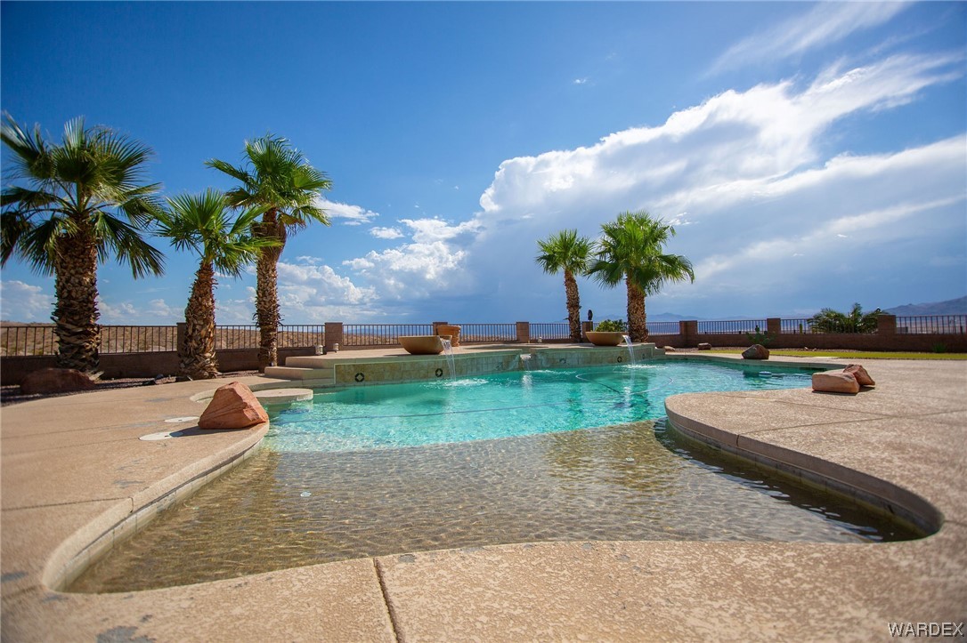 2660 Pegasus Ranch Road Bullhead City, AZ 86429 - Photo 53 of 57 a view of a backyard with swimming pool