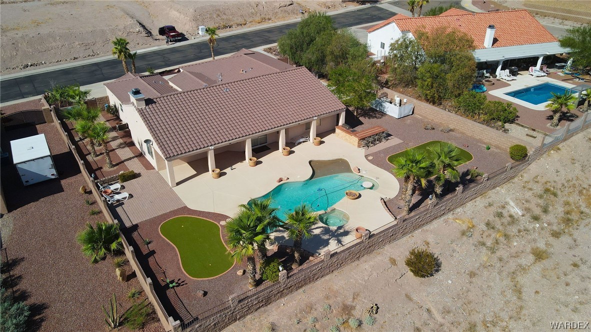 2660 Pegasus Ranch Road Bullhead City, AZ 86429 - Photo 56 of 57 an aerial view of a house with a swimming pool
